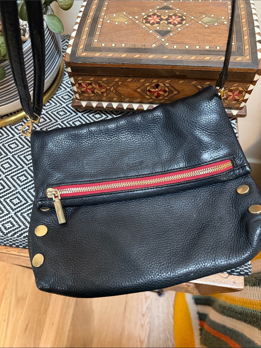 Hammitt Made in LA. Medium VIP. Black Leather Crossbody Bag with Red Zip accent.